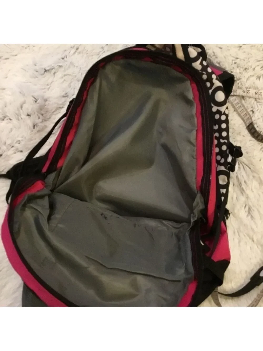 High Sierra pink black and White patterned backpack with suspension stra…